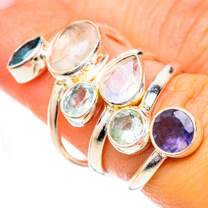 925 silver ring close-up with oval moonstone, purple tanzanite, and blue topaz stones