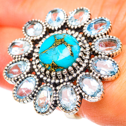 Large turquoise oval gemstone ring with oval blue stones in silver-tone settings