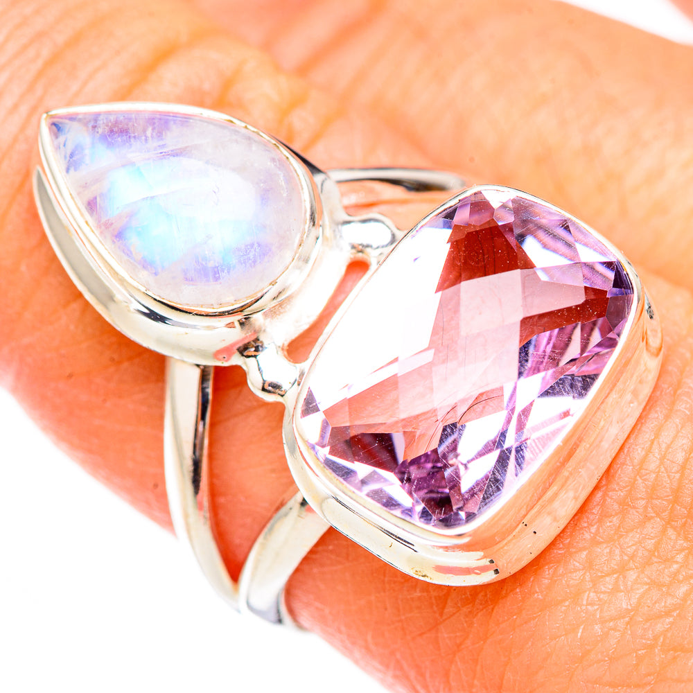 Sterling silver ring with glowing opalescent teardrop stone and faceted pink amethyst