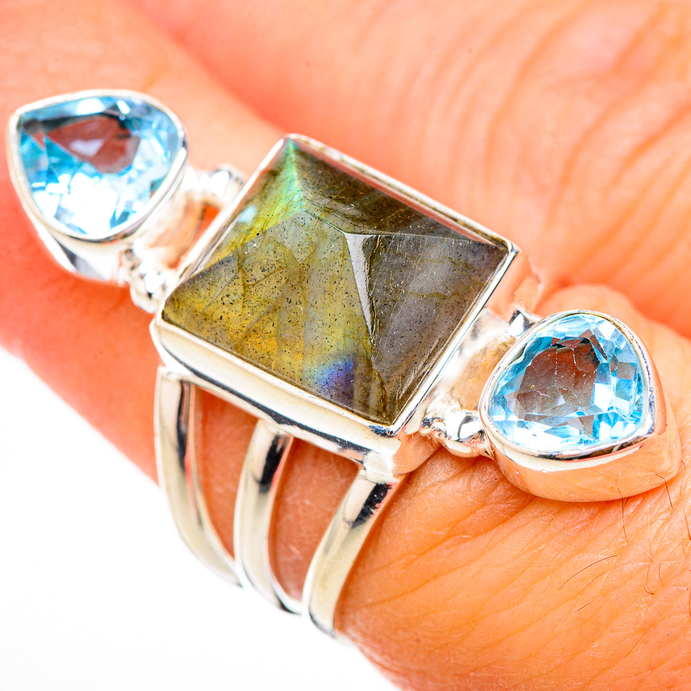 925 sterling silver ring with blue topaz teardrop accents and labradorite centerpiece