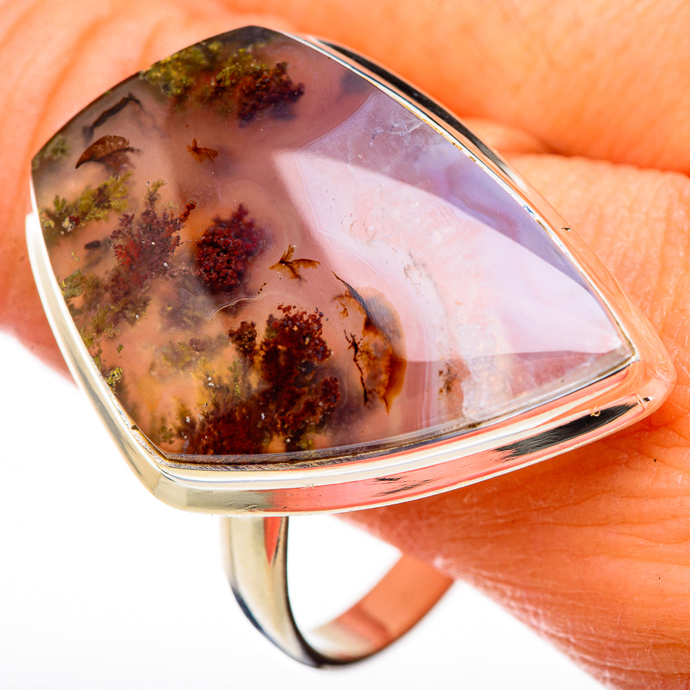 Large sterling silver plume agate ring with oval bezel and dark mossy inclusions