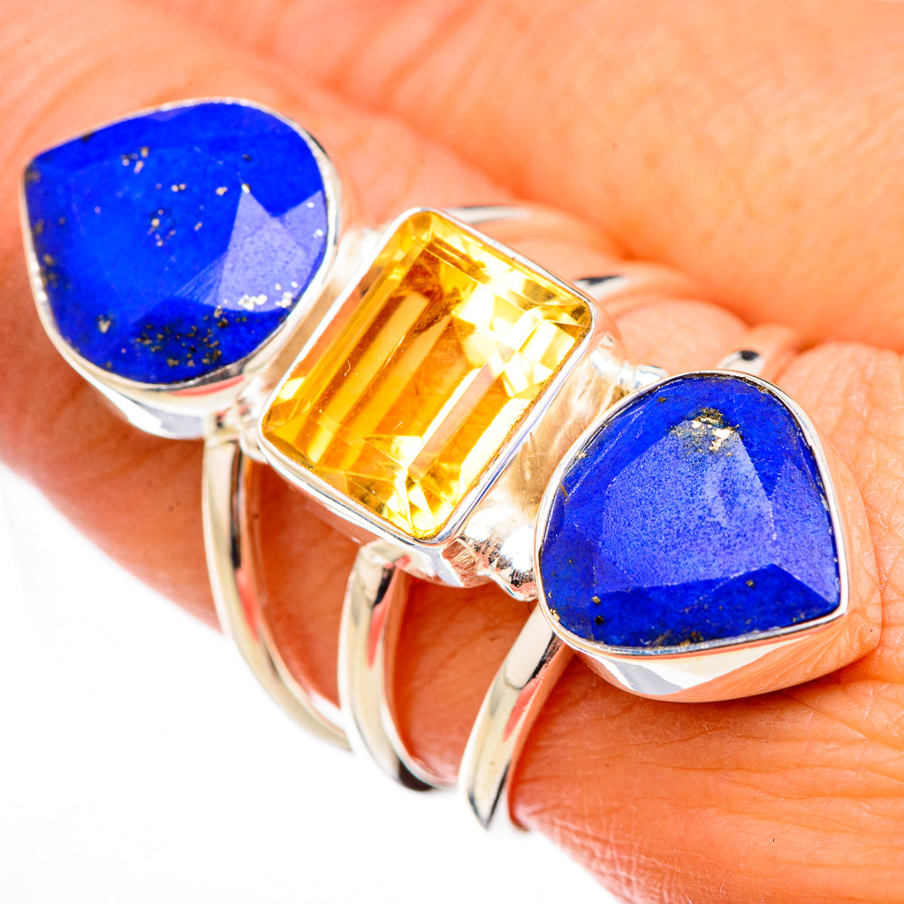 Sterling silver ring with oval blue lapis center and faceted yellow rectangular stone