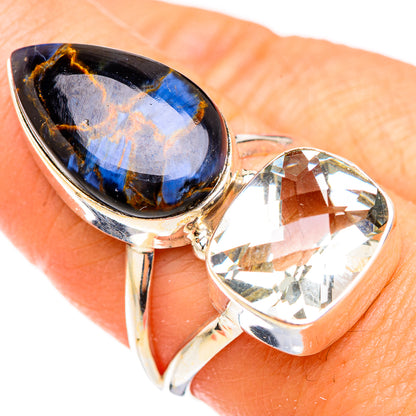 Sterling silver ring with blue pietersite teardrop and clear heart-cut gemstone