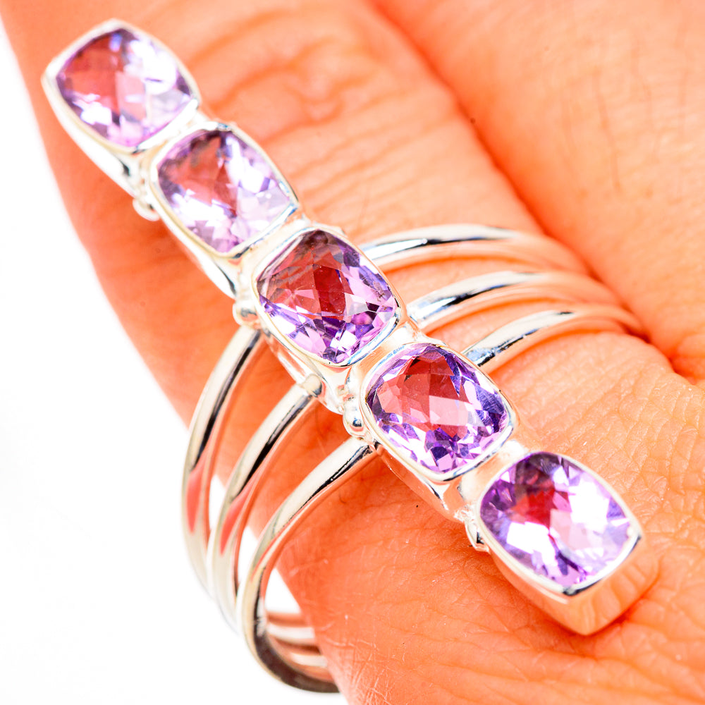 Sterling silver amethyst ring featuring faceted pink oval stones on a slim band