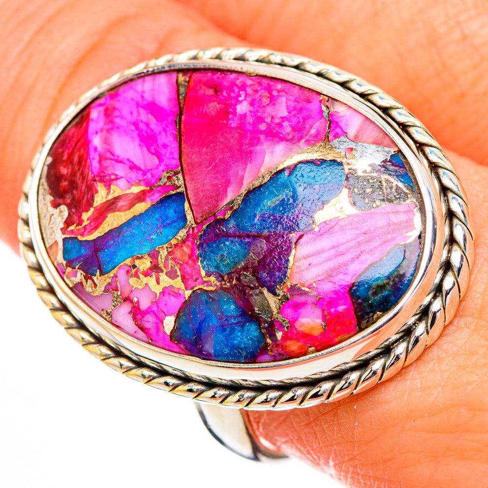 Oval sterling silver ring close-up, rope bezel with pink, blue, gold-fleck stone mosaic