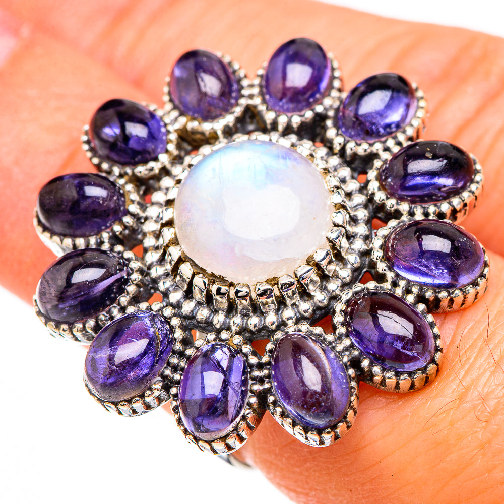 Gemstone cluster ring with opalescent round moonstone center and purple oval side stones, silver