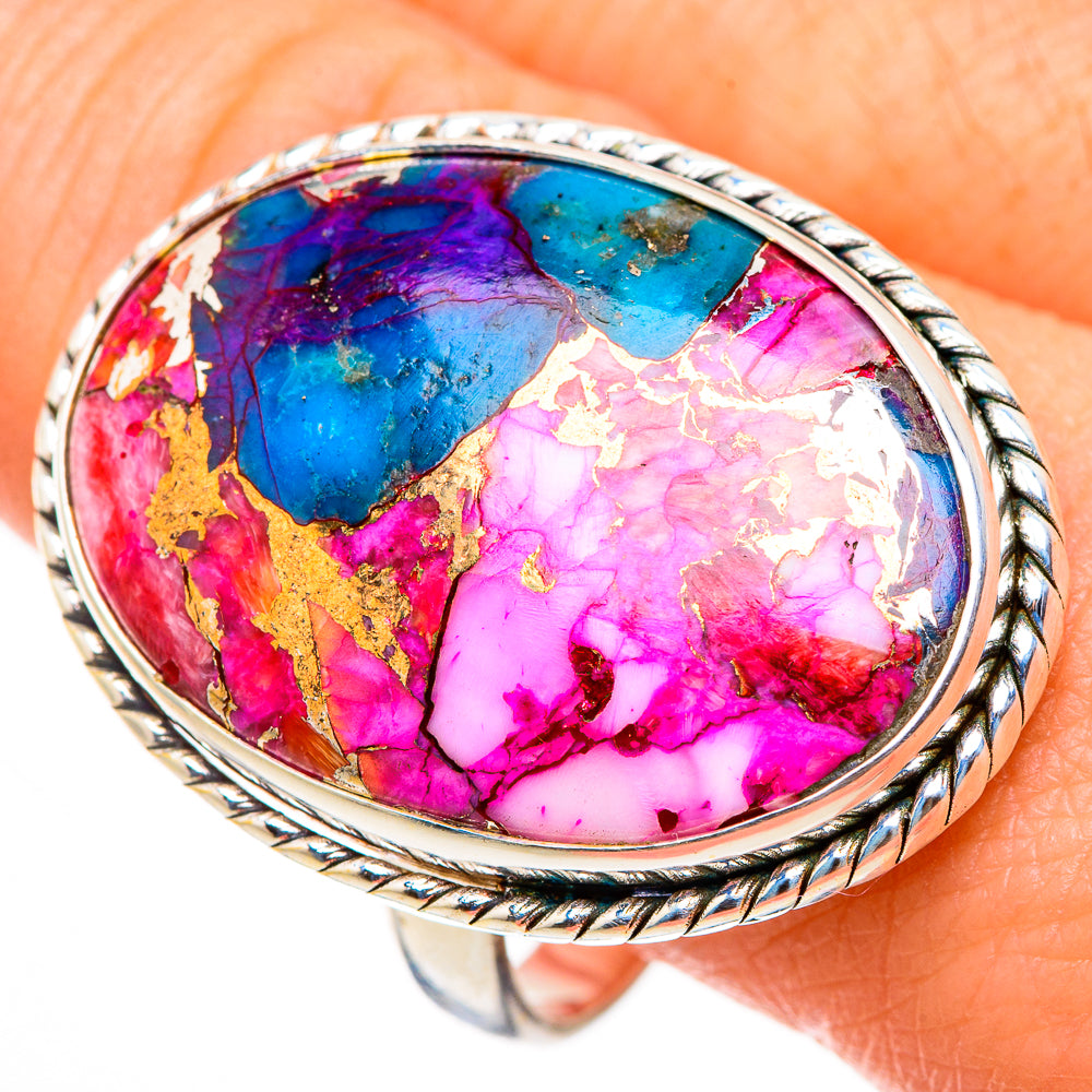 Oval turquoise gemstone ring with pink-blue mosaic and rope-edged sterling bezel