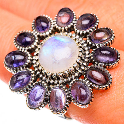 Moonstone cluster ring with large opalescent center and purple oval gemstone halo