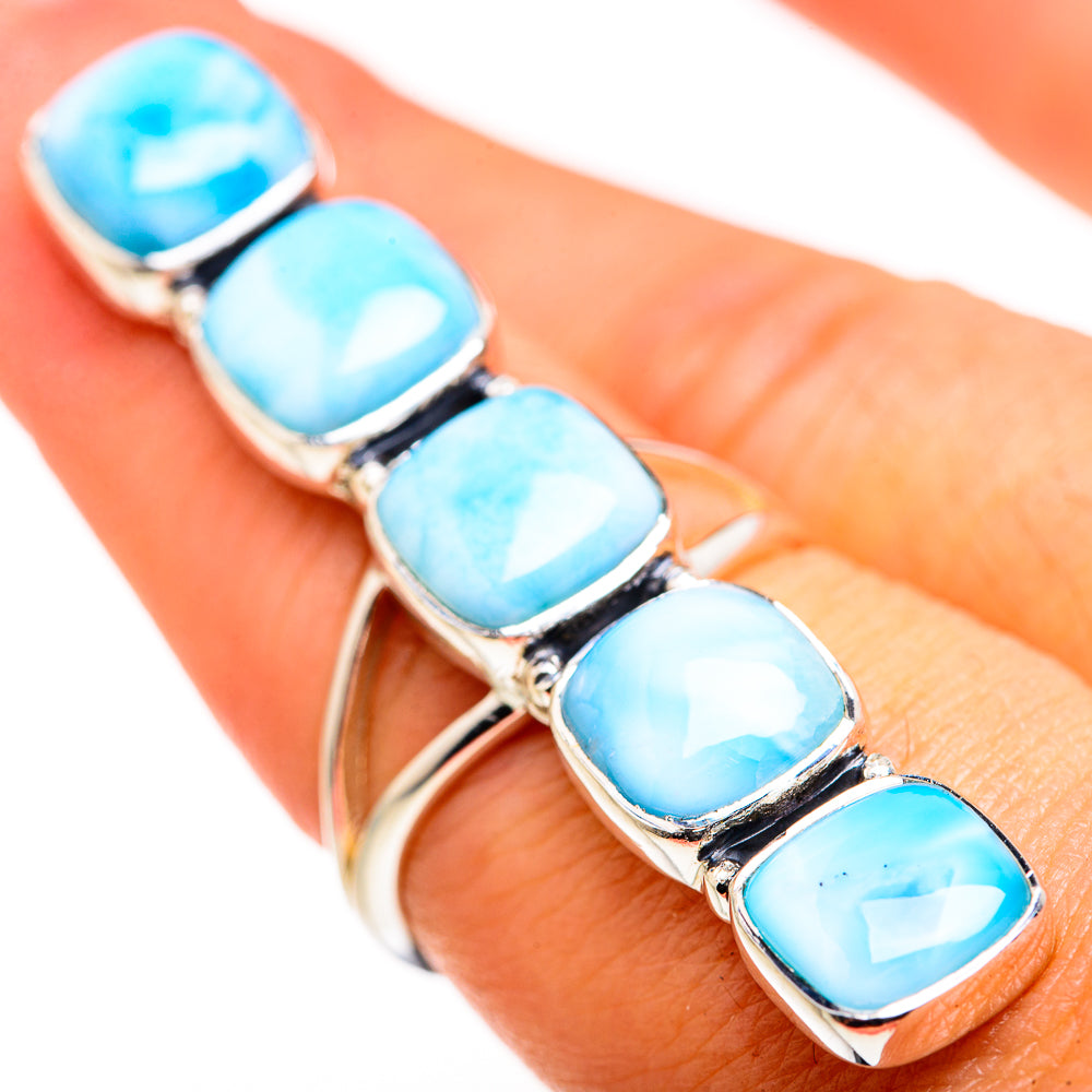 Larimar gemstone row ring with five oval light-blue stones on silver band
