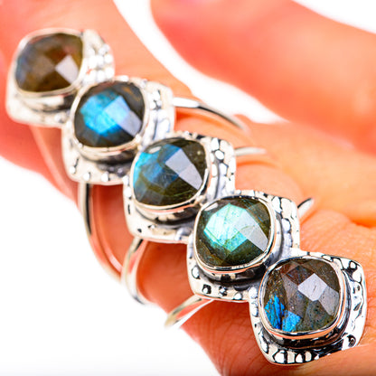Sterling silver ring with multiple oval labradorite gemstones and bezel settings