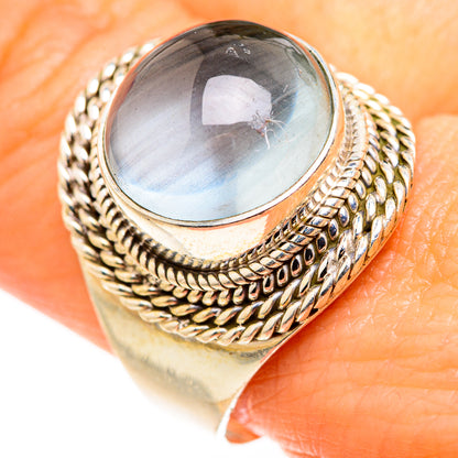 Aquamarine gemstone ring, oval light-blue stone in sterling silver, textured band