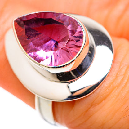 Sterling silver ring with oval color-change gemstone, purple-pink facets