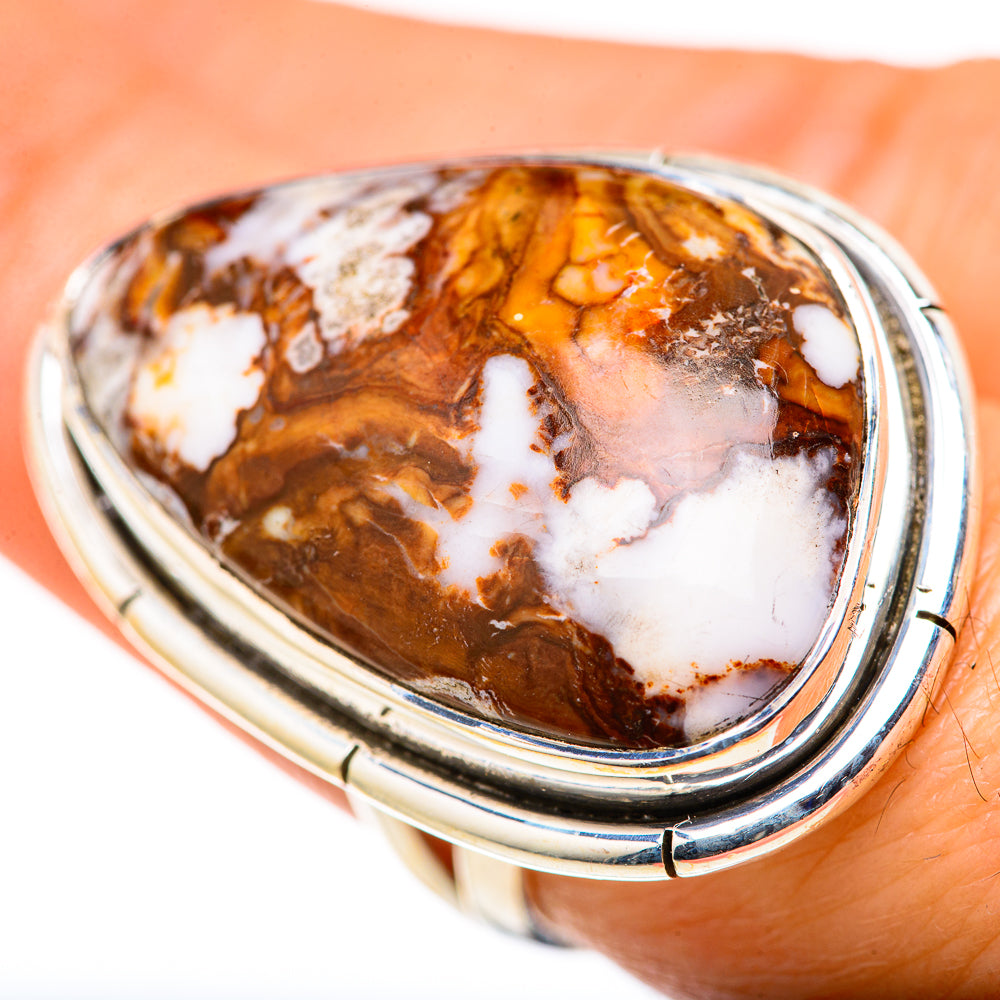 Sterling silver ring featuring oval jasper with brown, amber, and white swirls