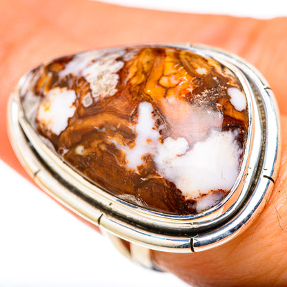 Sterling silver ring featuring oval jasper with brown, amber, and white swirls