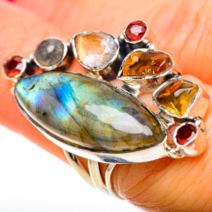Sterling silver ring featuring blue-green labradorite with yellow and red heart-shaped accents