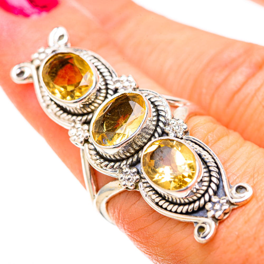 925 sterling silver ring with three oval citrine stones, textured edges, and prong details