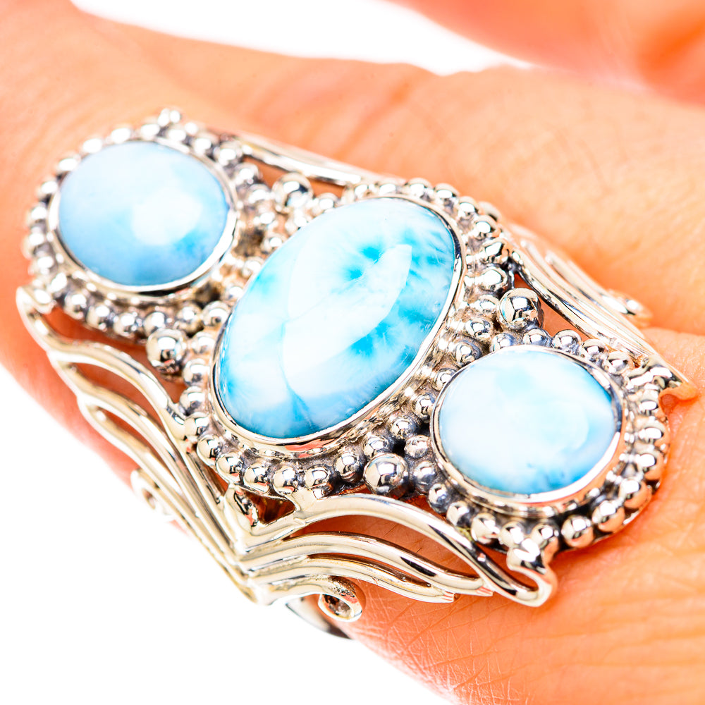 Three oval blue larimar stones ring in bright silver with beaded halo, on hand