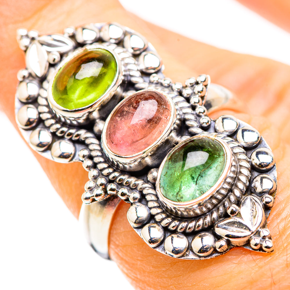 Silver ring with three oval tourmaline stones: green, pink, green