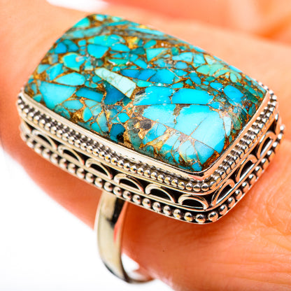 Large rectangular turquoise mosaic ring with detailed filigree border and silver-tone band