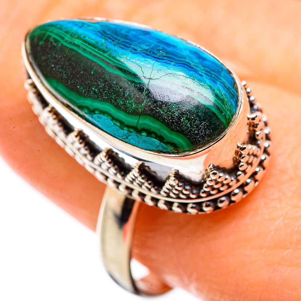 Oval malachite-and-chrysocolla cabochon ring with ornate silver bezel, blue-green stone