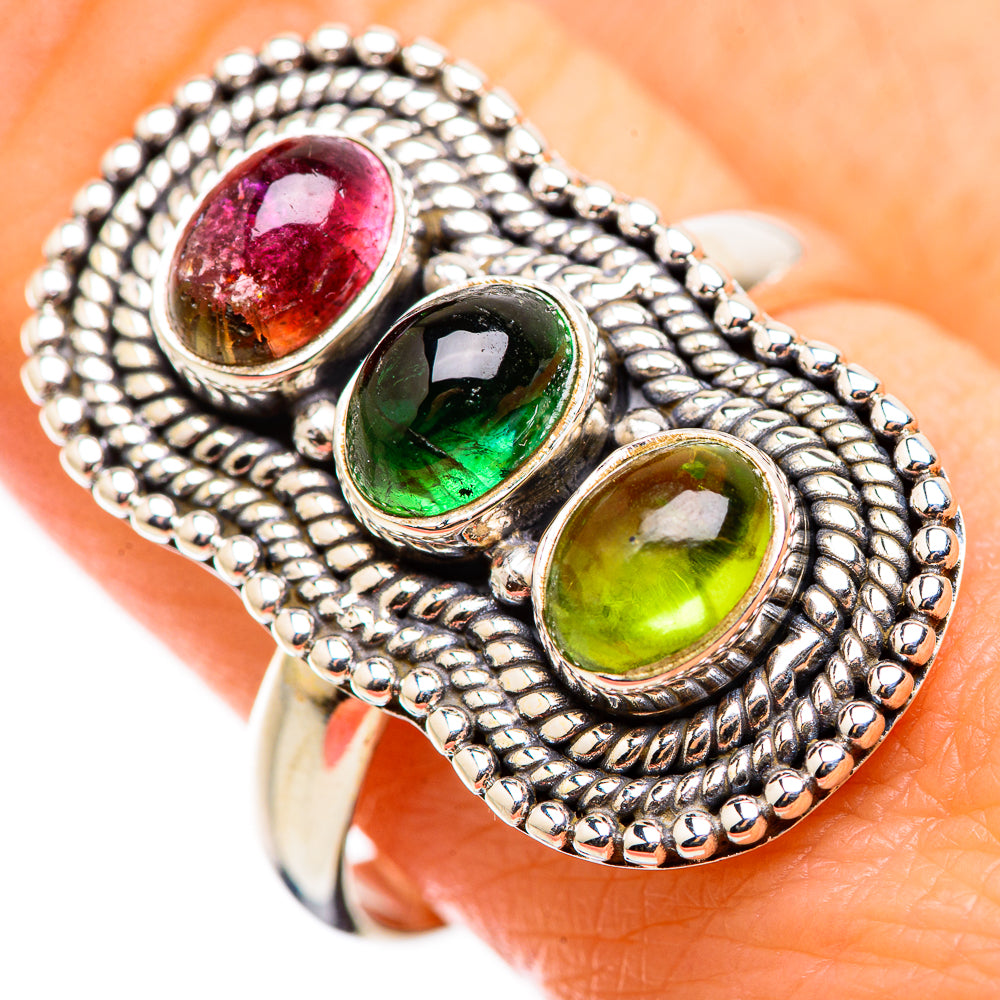 Sterling silver ring with three oval tourmalines: red, green, yellow; beaded bezel border