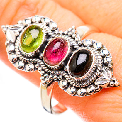 Ornate sterling silver ring with green and pink oval stones and dark center oval, size 11