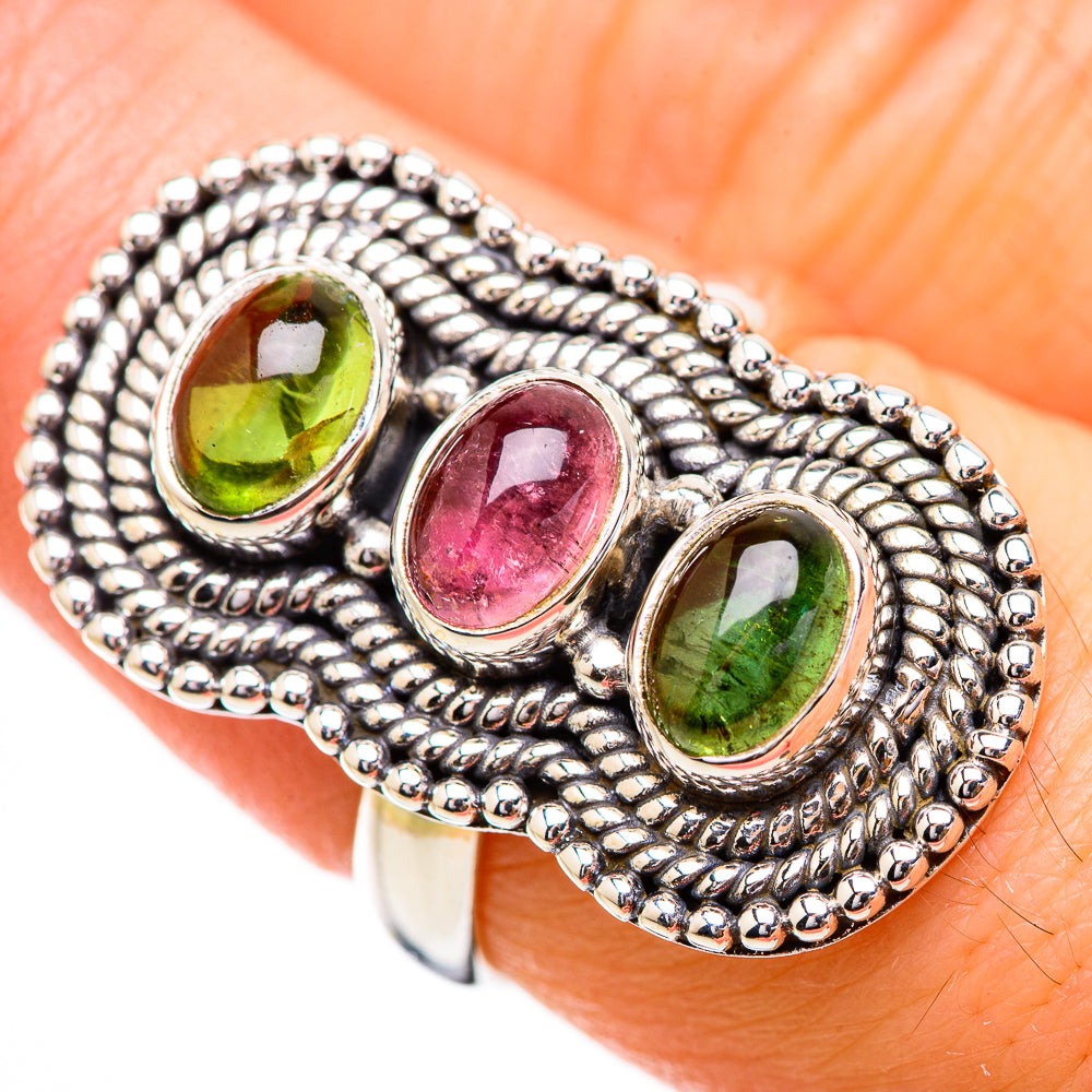 Sterling silver oval cabochon ring with green and pink tourmaline stones in bezels