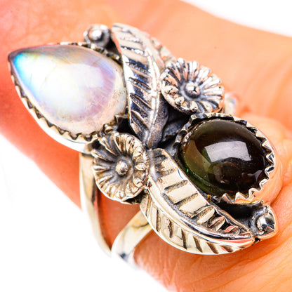 Gemstone ring with large pear moonstone, dark green oval stone, floral filigree details