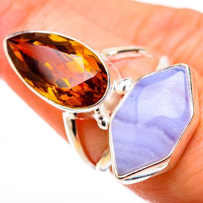 Sterling silver ring with dark amber oval gemstone and lavender marquise opal stone