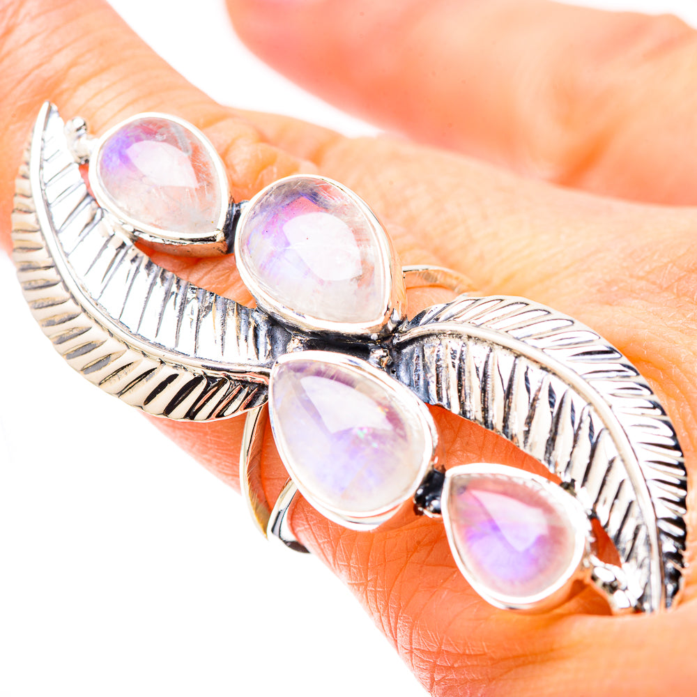 925 sterling silver ring with four teardrop moonstone cabochons in feather setting