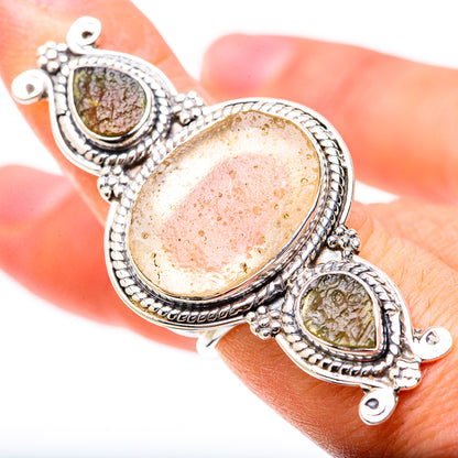 Sterling silver statement ring with large oval druzy-like stone and two small oval accents