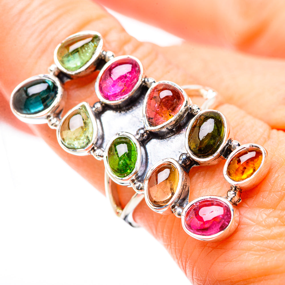 Sterling silver ring with colorful oval gemstones, prong-set halo design