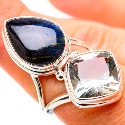 Sterling silver ring with dark blue oval stone and clear cushion stone, size 6.5