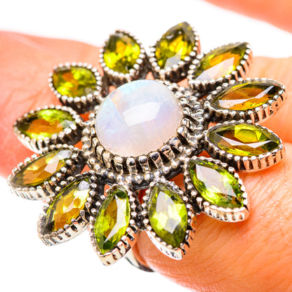 Sterling silver ring with round white opal center and yellow-green marquise side stones
