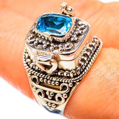 Sterling silver ring with large oval Swiss blue topaz and decorative beaded bezel
