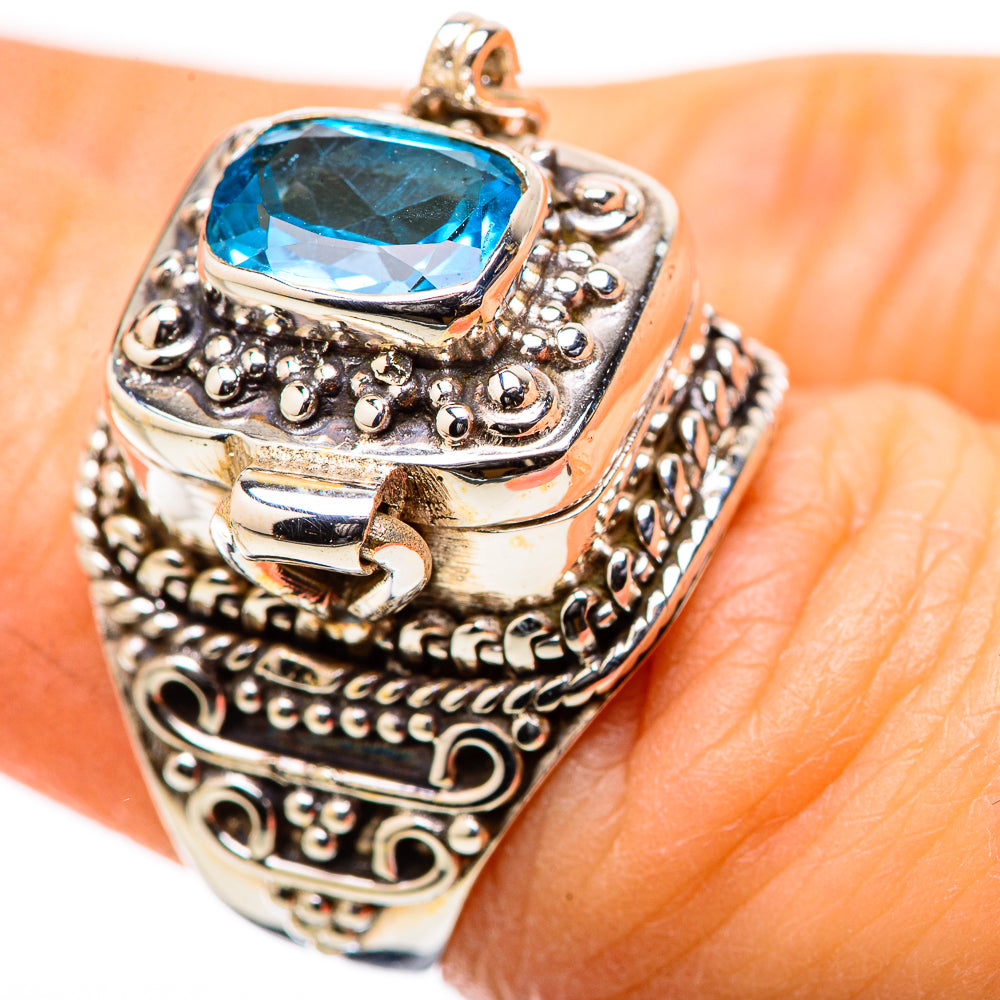 925 sterling silver ring with oval blue Swiss Topaz and ornate filigree setting