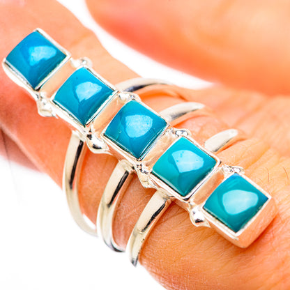 Turquoise square-stone sterling silver ring with linked settings on open band