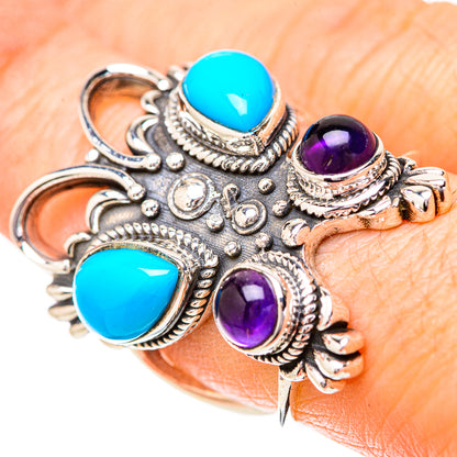 Sterling silver owl ring with turquoise and purple cabochon stones, textured details