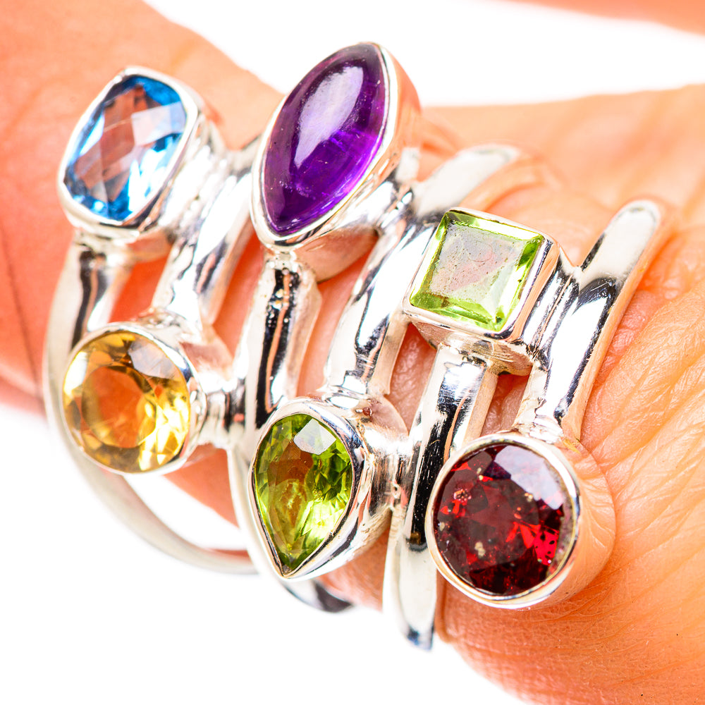 Sterling silver multi-gem ring with blue, purple, green, yellow, and red faceted stones