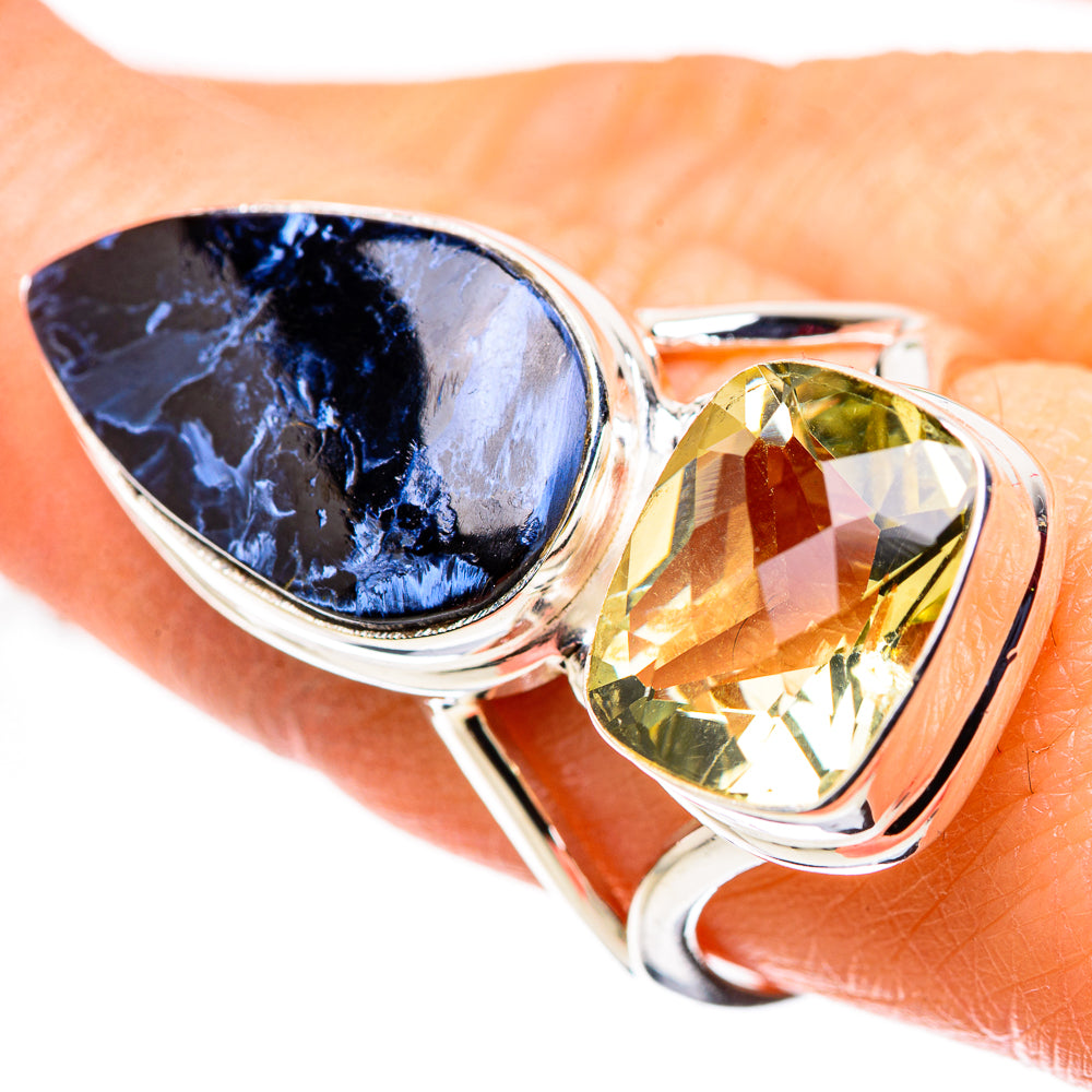 Sterling silver ring with oval blue pietersite and faceted teardrop yellow citrine