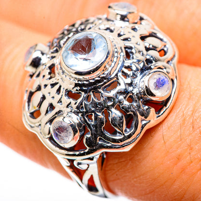 Sterling silver filigree ring with large oval moonstone and small purple-blue stones