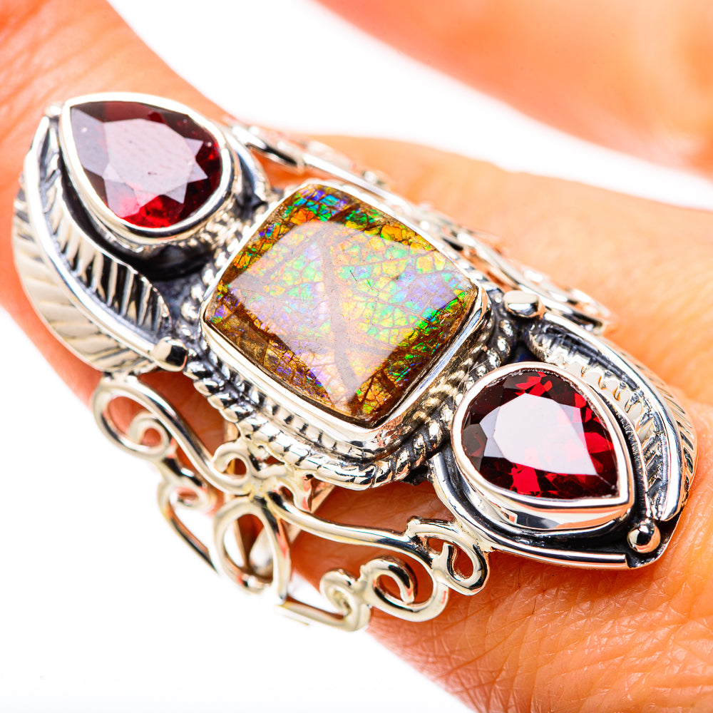 925 sterling silver ammolite-and-garnet ring with oval centerpiece and red side stones, size 7.5