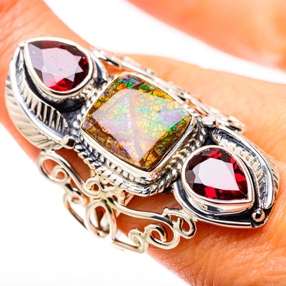 925 sterling silver ammolite-and-garnet ring with oval centerpiece and red side stones, size 7.5