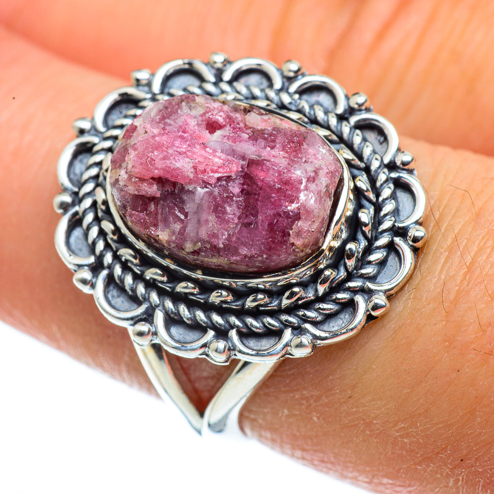 Sterling silver filigree ring with oval pink gemstone bezel setting