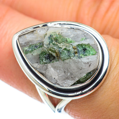 Oval quartz cabochon ring with green tourmaline in polished sterling silver bezel
