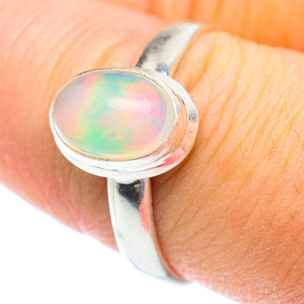 Sterling silver opal ring with oval opal cabochon set in bezel