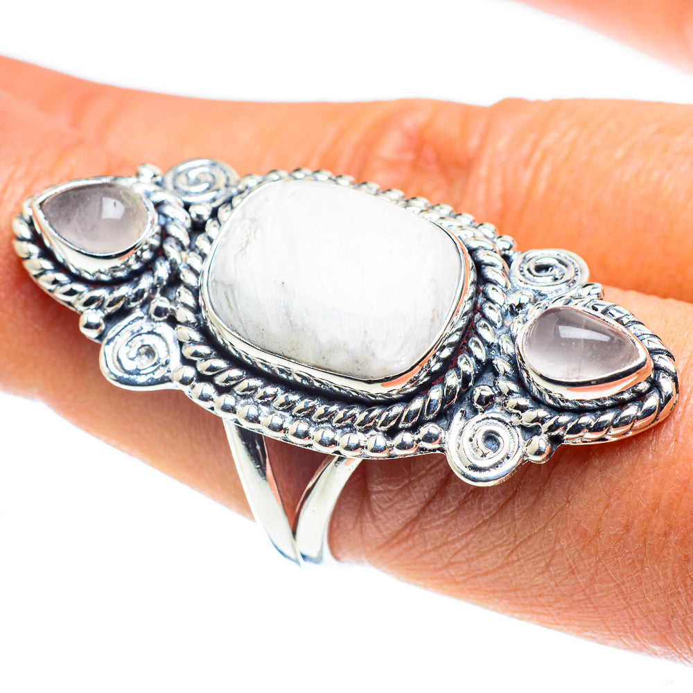 Silver-tone statement ring with two oval white stones and ornate rope prong setting