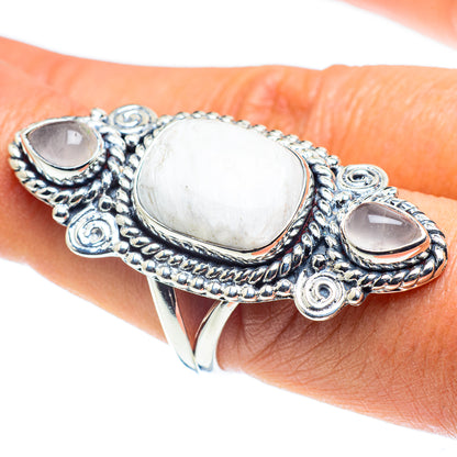 Silver-tone statement ring with two oval white stones and ornate rope prong setting