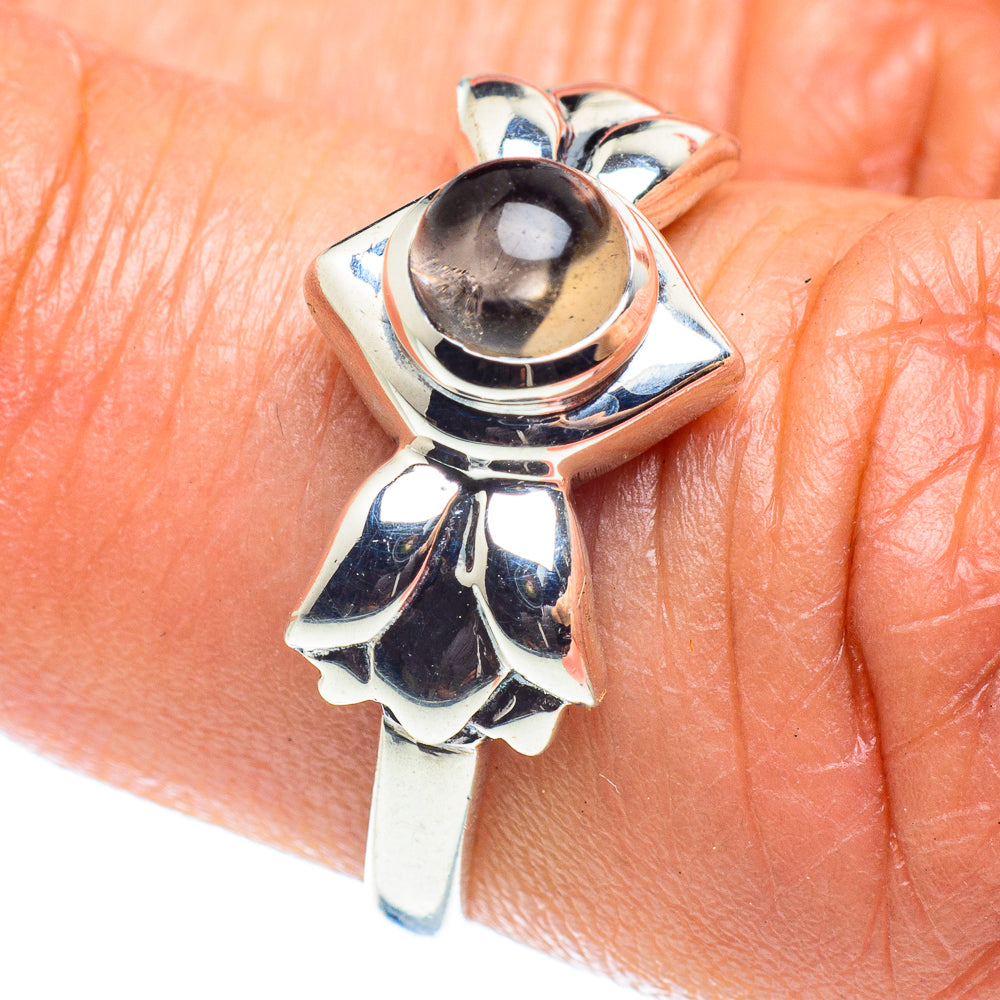 Sterling silver smoky quartz ring with dark oval cabochon, openwork prongs