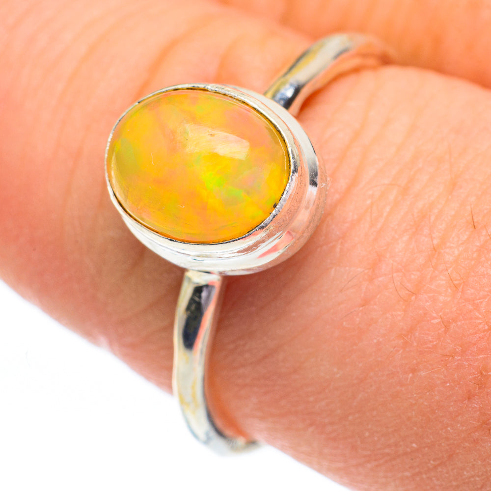 Sterling silver opal ring with oval orange-yellow Ethiopian opal cabochon, size 8.25